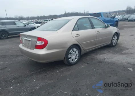 2002 Toyota Camry Xle z USA, uszkodzony, nr VIN 4T1BE32K22U538166